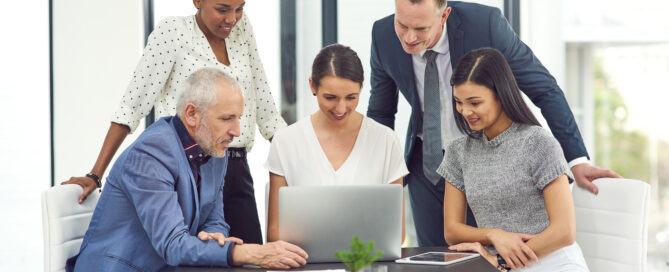 Talking business. Cropped shot of a group of businesspeople having a meeting together in an office